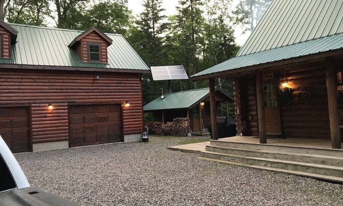 Champion Cabin | Remote log lodge in the Huron Mountain foothills.