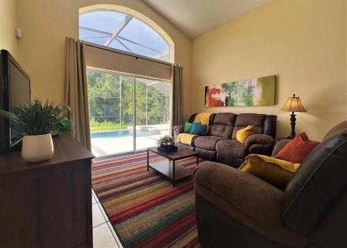 Kissimmee House | Restful 4br 3ba With Bbq, Heated Pool & Spa