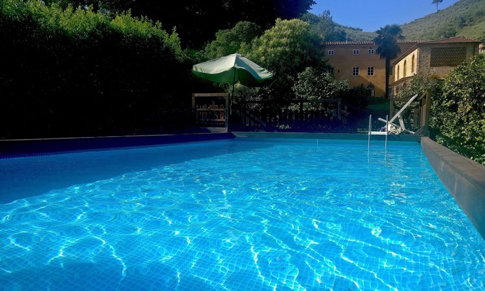Sant'Andrea di Compito House | Restored barn with large pool and mountain stream
