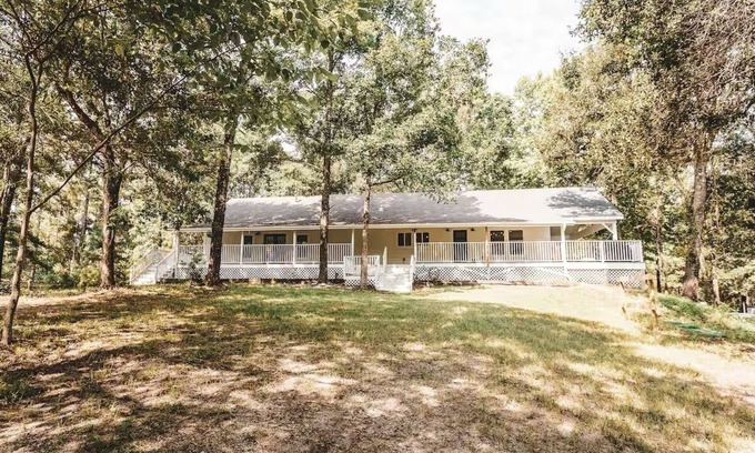 Coldspring Other | Retreat to the country. Three updated farmhouses, 28 acres, pickleball court.