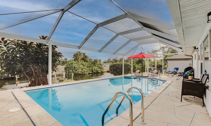 Port Charlotte House | Riverfront Florida Retreat w/Pool, Patio & Grill!