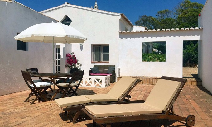 Lagos Cottage | Rustic Family Room with Mezzanine and Large Sun Terrace