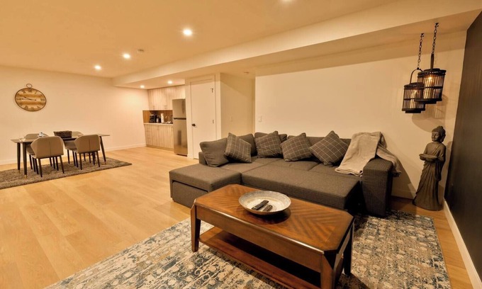 Airdrie Apartment | Rustic Lake‑Front Private Basement Suite Court Access & Gym