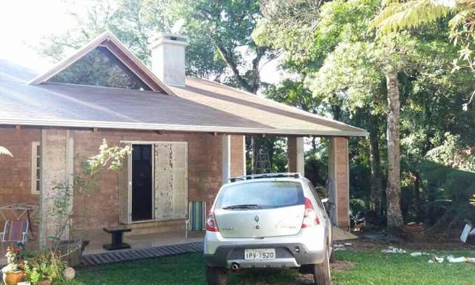 Sao Francisco de Paula House | Rustic Stone House in Condominium.