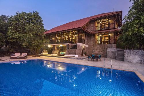 Suryamal Villa | SaffronStays Vedika - EcoFriendly villa by the River with Pool
