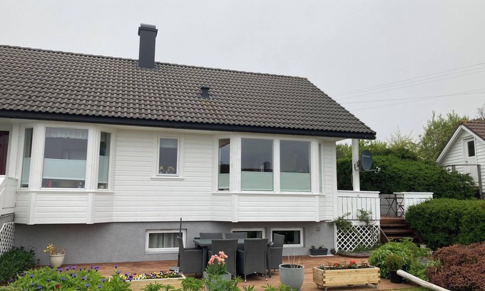 Sandve Apartment | Sandve, spacious apartment, in quiet neighborhood. Sea view.