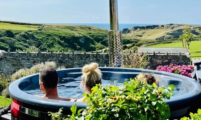 Tintagel House | Sea views just yards from restaurants, pubs & shops. Sleeps 16-18, 8 x en-suite.