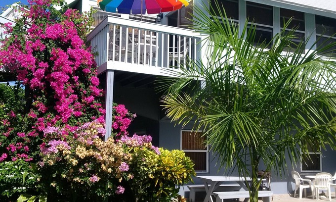 Kittian Village Condo | Sealofts37 Nestled in a Quiet Tropical Garden. Pool View, on the beach.