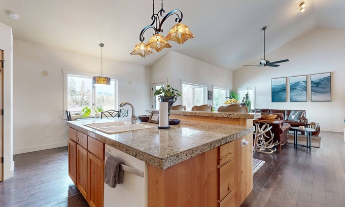 Columbia Falls House | Secluded riverfront home with water views & access, firepit, & grill