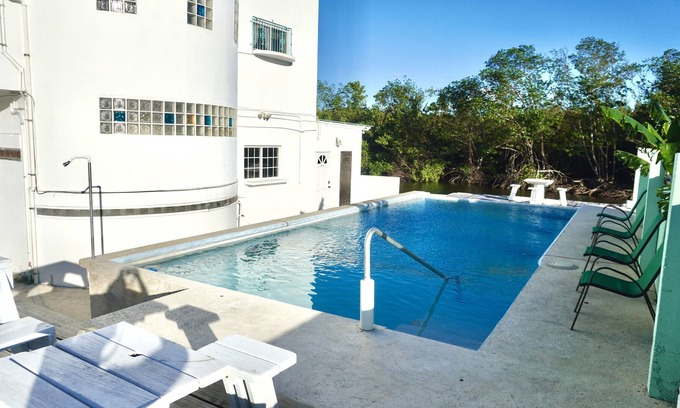 Belize City Apartment | See Belize TRANQUIL Sea View 2nd Floor Studio with Pool and Overwater Deck