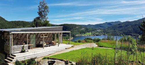 Hyllestad House | Self-Built Cabin With Views Over Leirvik