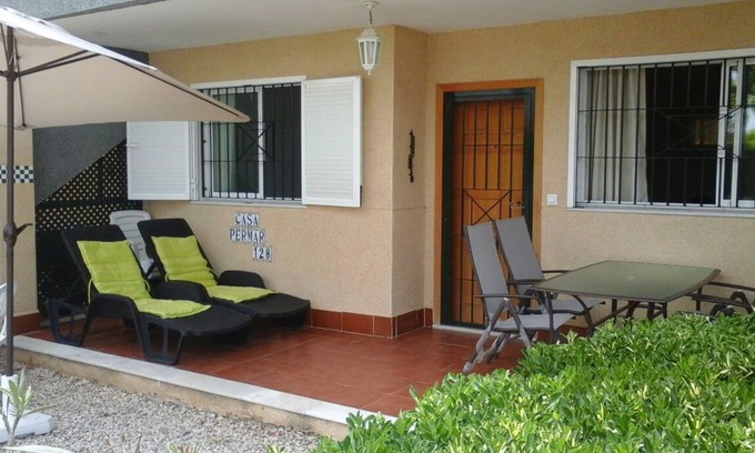 Los Arenales del Sol House | Semi-detached with garden + pool near beach, fiber WiFi + garage. We Speak Engl