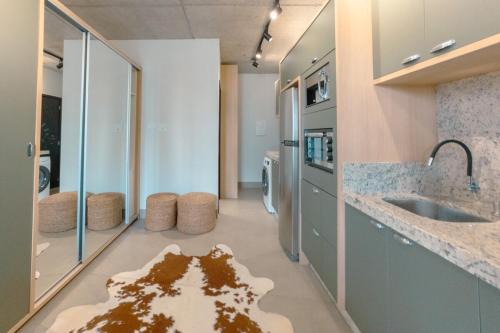 Zona 01 Apartment | Seu Refúgio Sofisticado no Centro de Maringá