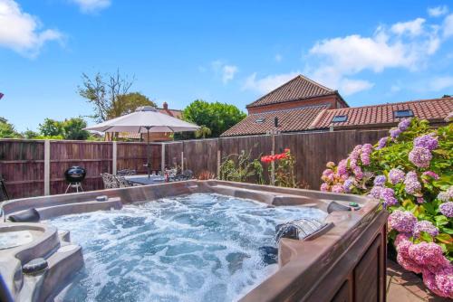 Thorpe Market House | Seven Space - Sandpit Cottage, 3 Bed Stay with Hot Tub