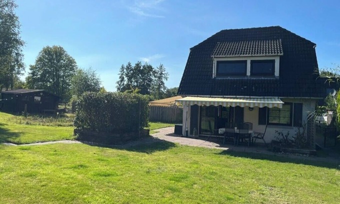 Bedekaspel House | Shore happiness on the Great Sea with boat, canoes and kayak. Dog friendly!