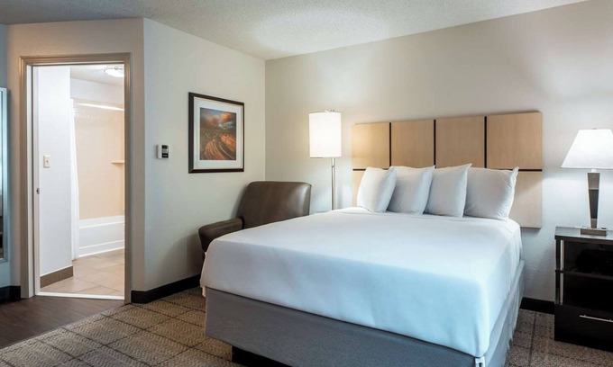 Park Central Hotel | Short Drive to The Dallas Arboretum and Botanical Garden! FREE Parking Onsite!