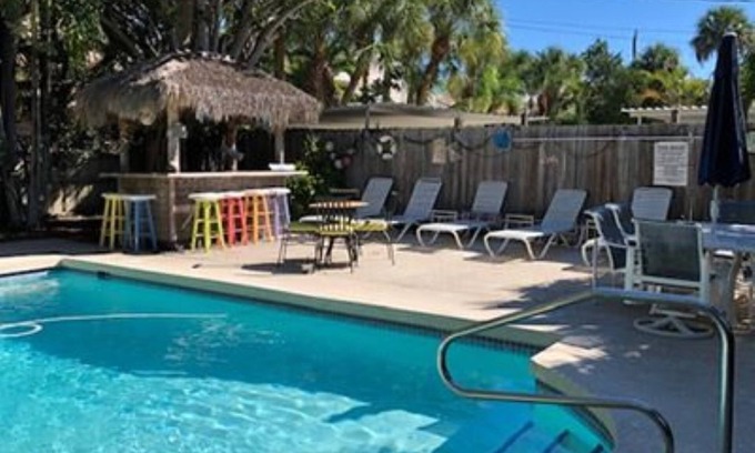 Siesta Key Village Apartment | SHORT WALK TO VILLAGE, BEACH - HEATED POOL - LUSH LANDSCAPING.nTWO UNITS.