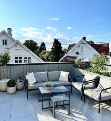 Stavanger Apartment | Sjarmerende og sentralt beliggende leilighet med stor ballkong på Storhaug - Perfekt sommerleie!