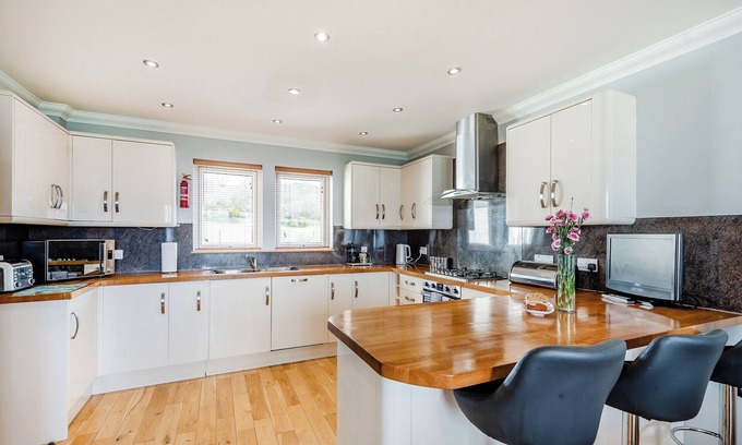 Innellan Cottage | Sky View is a detached new house for 6/8 enjoying spectacular sea views across to the Isle of Bute.