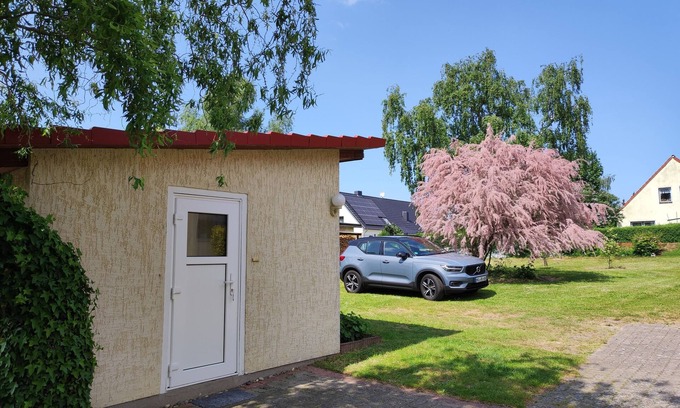 Hagebok House | Small bungalow for two people with a sunny terrace. Near the Baltic Sea.