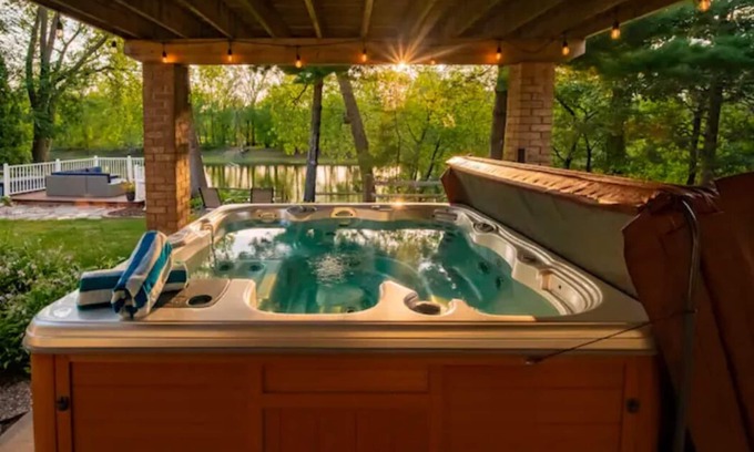 Fridley House | Soak, Relax & Gather - Spacious River Home - Hot Tub, Massage Chair & Kayaks