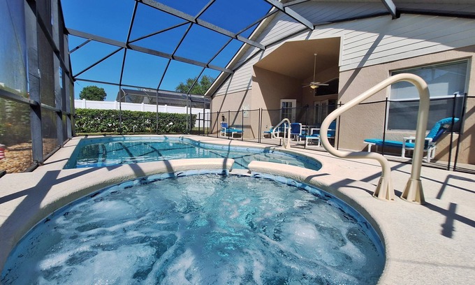 Orange Tree Villa | South facing four bedroom home, solar heated private pool, spa and games room.