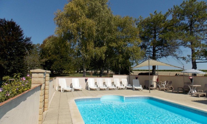 Angeduc Cottage | Spacious cottage with heated pool, garden, WIFI, and pet-friendly