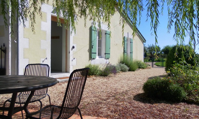 Soumeras House | Spacious, double height, beamed main space. This gite is in a rural setting.