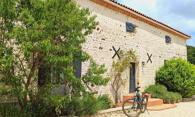 Montmoreau-Saint-Cybard Cottage | Spacious Stone House with Shared Pool, Babyfoot, and Nature Trails in Bucolic Setting