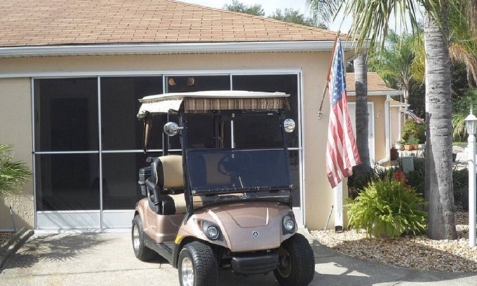 The Villages House | Spanish Springs area Courtyard Villa w/Golf Cart & Clubs