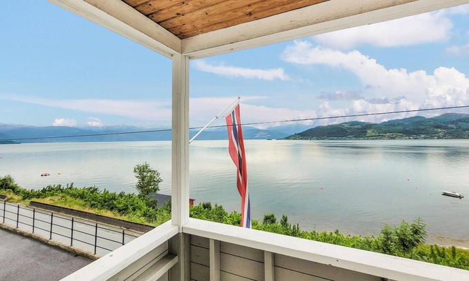 Oystese House | Spend an unforgettable vacation by the fjord in this comfortable vacation home.