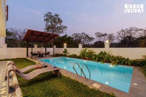 Siolim Villa | StayVista at Casa Ti Amo with WiFi, AC, Pool, BBQ
