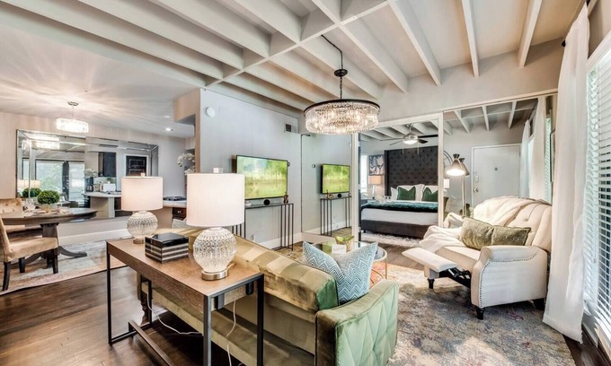 Old East Dallas Condo | Step into timeless Dallas luxury in this meticulously curated 1-bedroom retreat, blending modern comfort with historic charm. The residence offers a king luxury hybrid mattress dressed in 300-thread-count Egyptian cotton, plush 800 GSM Towels.