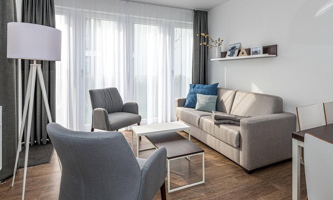 Bensersiel Apartment | Strandnahes Ferienapartment mit Terrasse, Parkplatz, Schwimmbad- & Saunanutzung