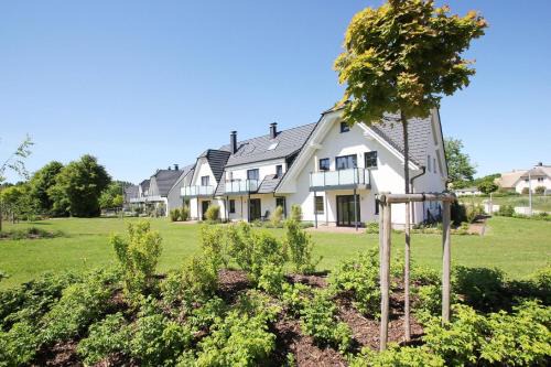 Lobbe Apartment | strandnahe FeWo mit Terrasse, gratis Nutzung vom AHOI Erlebnisbad und Sauna in Sellin - Rex Rugia FeWo 11-2