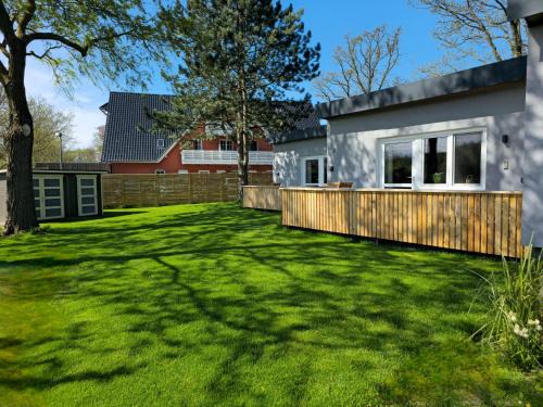 Graal Mueritz Apartment | "Strandvergnügen", 100 m zum Traumstrand, ganzer Terrassen-Bungalow mit Parken