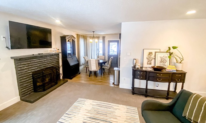 Taku - Campbell House | Striking home with fireplace, kitchen, gas grill, patio, deck, & washer/dryer
