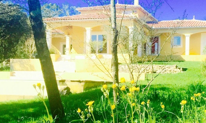 Sardan Villa | Stunning Mediterranean Villa with Waterfall Swimming pool a large garden.