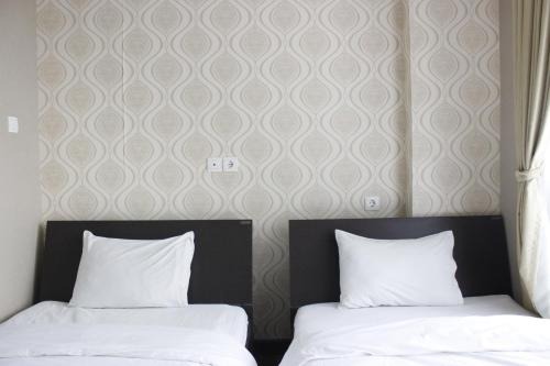 Hegarmanah Apartment | Stylish 1BR near ITB University at Dago Suites Apartment By Travelio