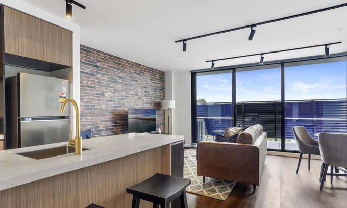 Brunswick Apartment | Stylish King Bed Apartment with Parking and Views