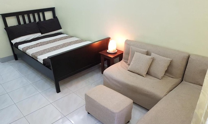 Balibago Apartment | STYLISH SECLUDED 4BR LODGE NEAR ENCHANTED KINGDOM + 2MIN WALK TO BALIBAGO COMPLEX