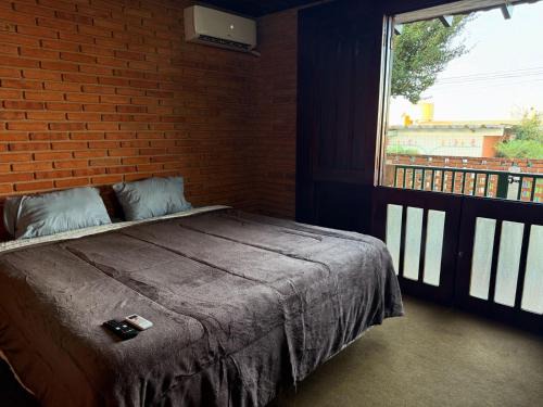 Botucatu House | Suíte king com ar condicionado