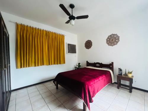 Enseada House | Suíte suspensa Guarujá