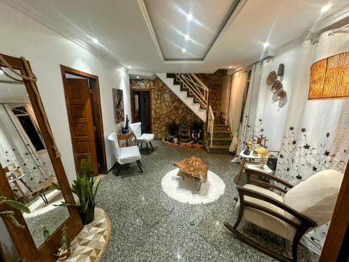 Belo Horizonte House | Suite casal 2 com frigobar