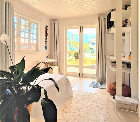 Praia Rasa Apartment | SUITE DA FRENTE COM COPA, WIFI E ACESSO INDEPENDENTE