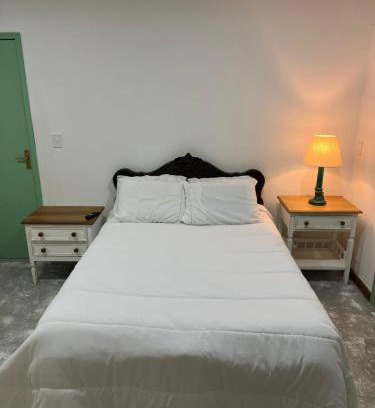 Areal House | Suite IPÊ ROSA