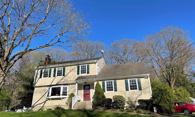 Greenwich House | Summer retreat with salt water pool on tranquil woods.