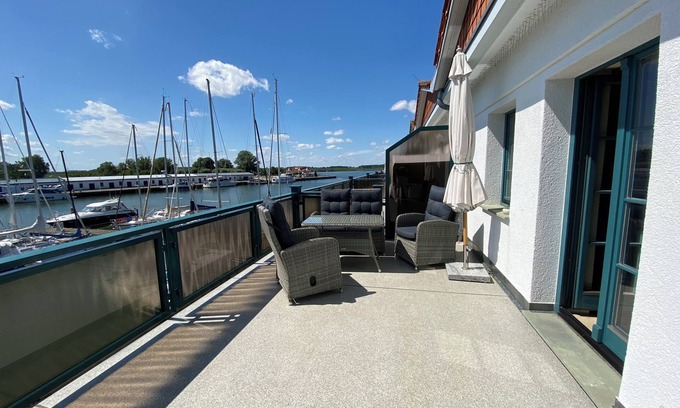 Karlshagen Apartment | Sunny apartment with large balcony overlooking the marina