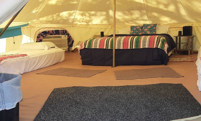 Spring Branch RV Rental | Sunset Ridge Glamp Tent Queen Bed, 2 cots, AC and Electric