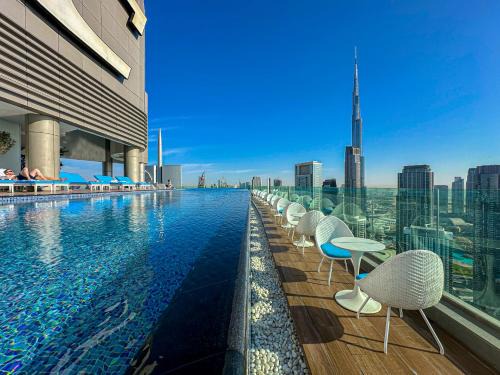 Downtown Dubai Apartment | Super High Infinity Pool and amazing Burj Khalifa View 3 Bedroom apartment in Paramount Hotel Midtown
